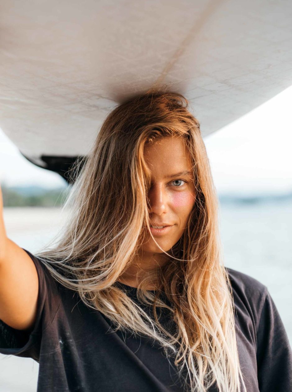 surfer-girl-on-beach-RF74LBQ-scaled.jpg